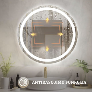 Apvalus veidrodis su ijungta sildymo funkcija, apsaugantis pavirsiu nuo rasojimo dregnoje vonios aplinkoje.